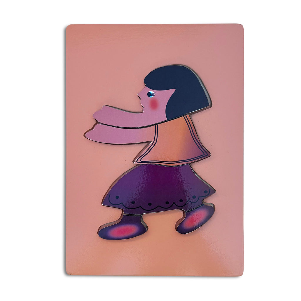 Girl tray puzzle assembled on a peach board