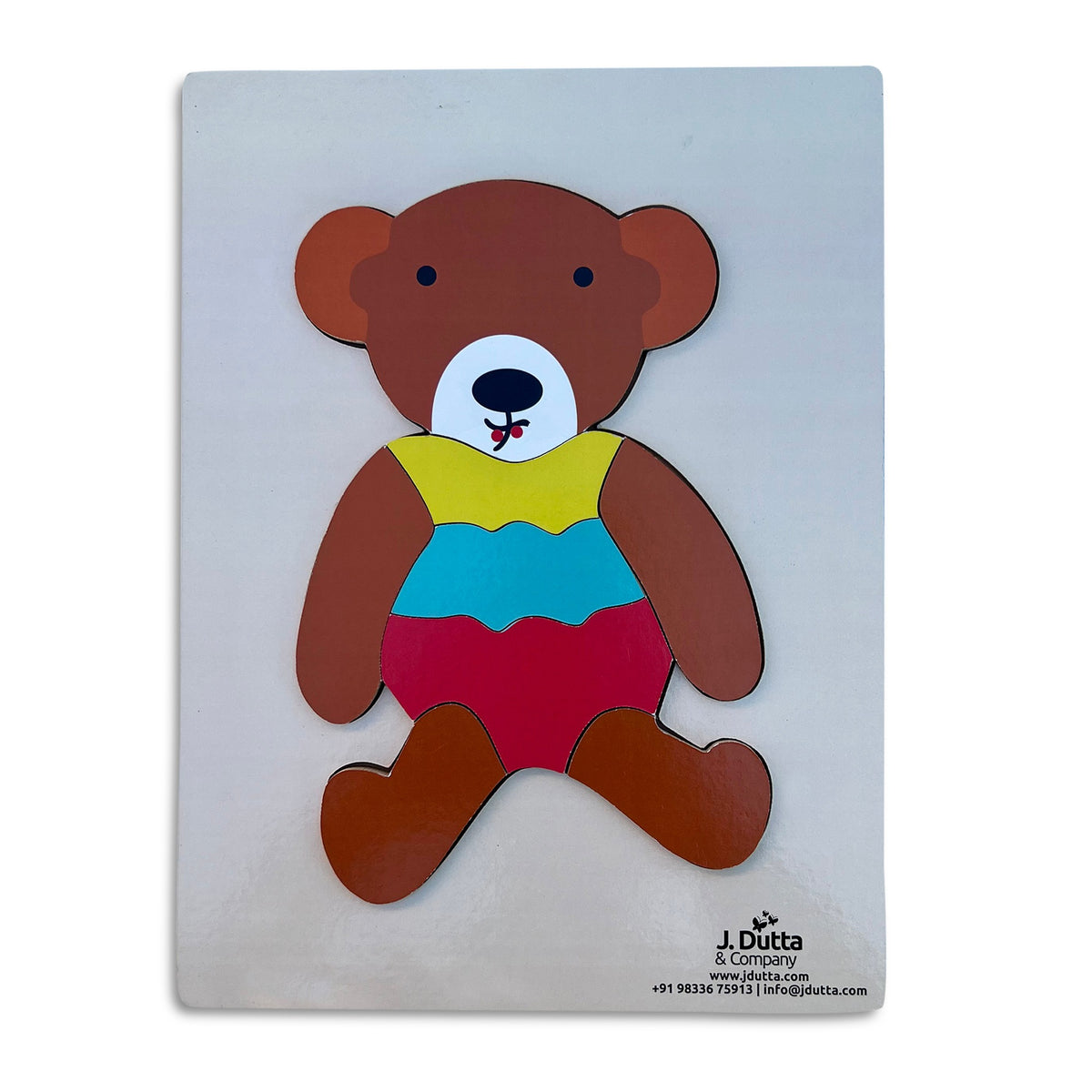 Teddy bear tray puzzle assembled on a white board