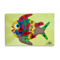 Fish alphabet puzzle: wooden tray with a fish made of colourful A–Z letter pieces