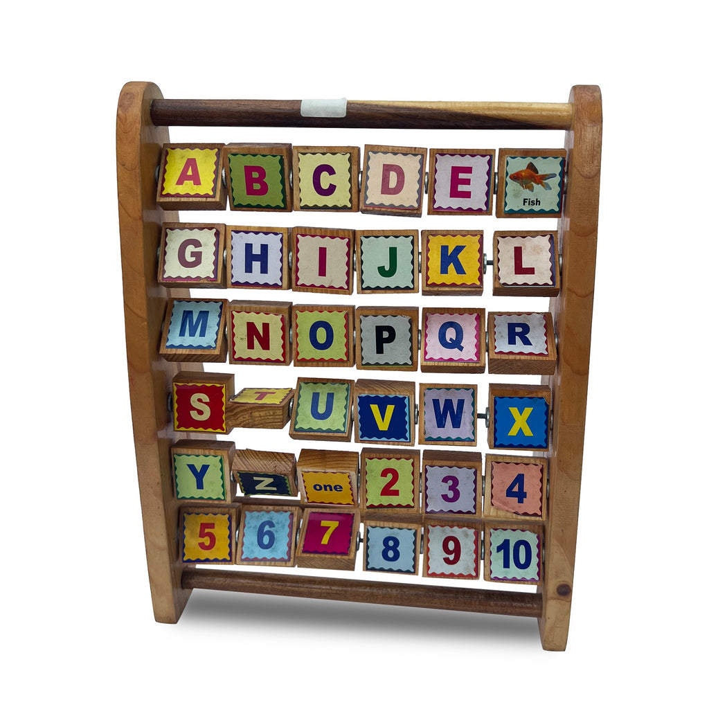 Picture word stand with rotating cubes showing A–Z and numbers 1–10