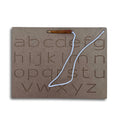 Wooden board carved with English small letters a–z and an attached stylus