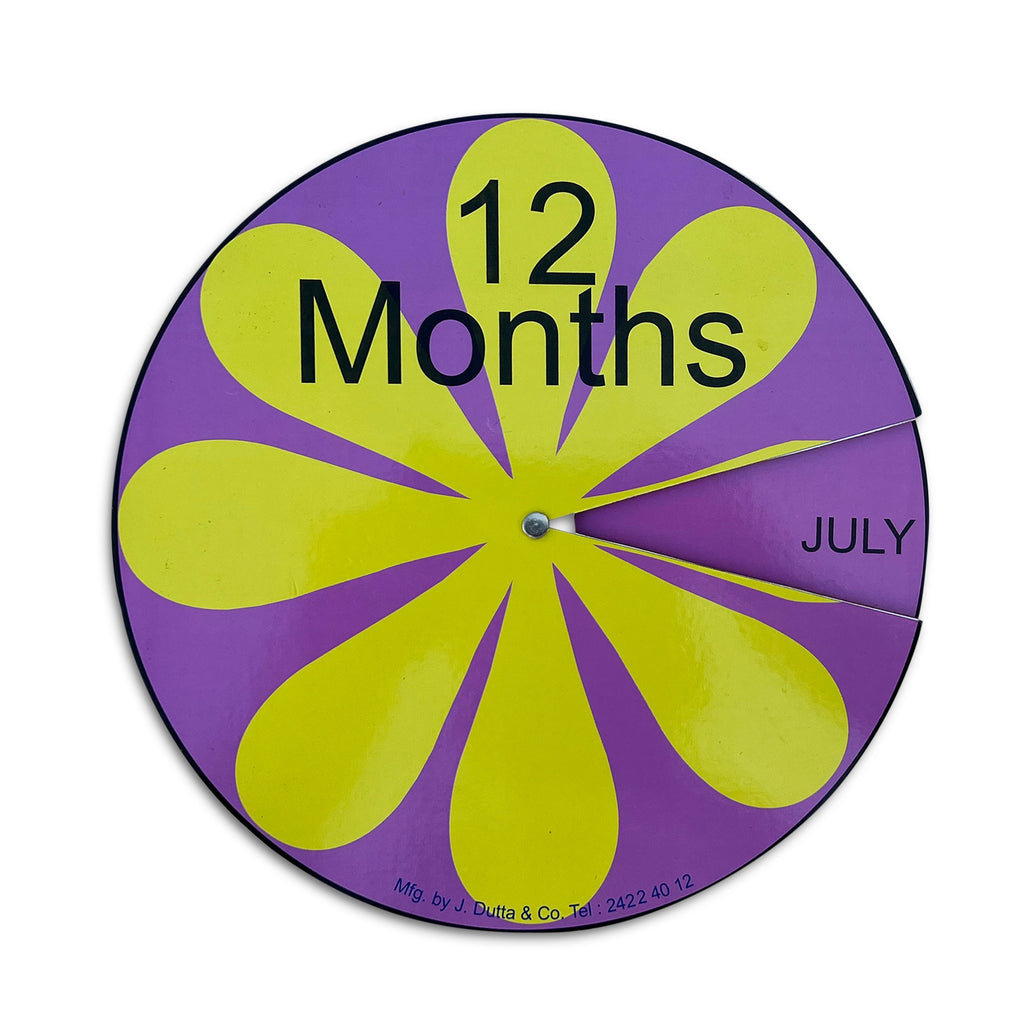 12 Months revolving wheel in purple and yellow showing JULY