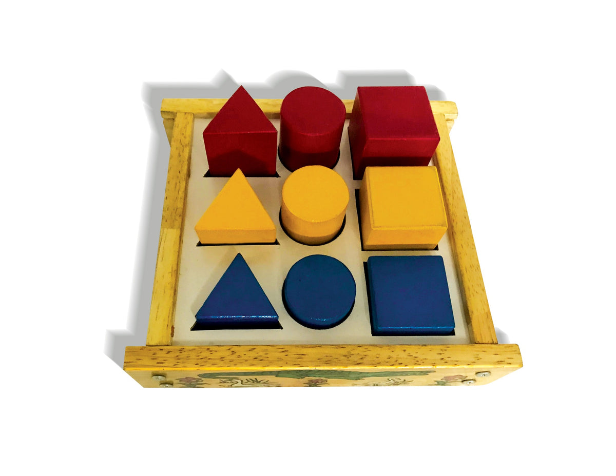 Beginners shapes tray with prisms, cylinders and cubes in red, yellow and blue