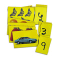 Hindi counting jigsaw tablets: १ with a car, ३ with strawberries, ५ with butterflies