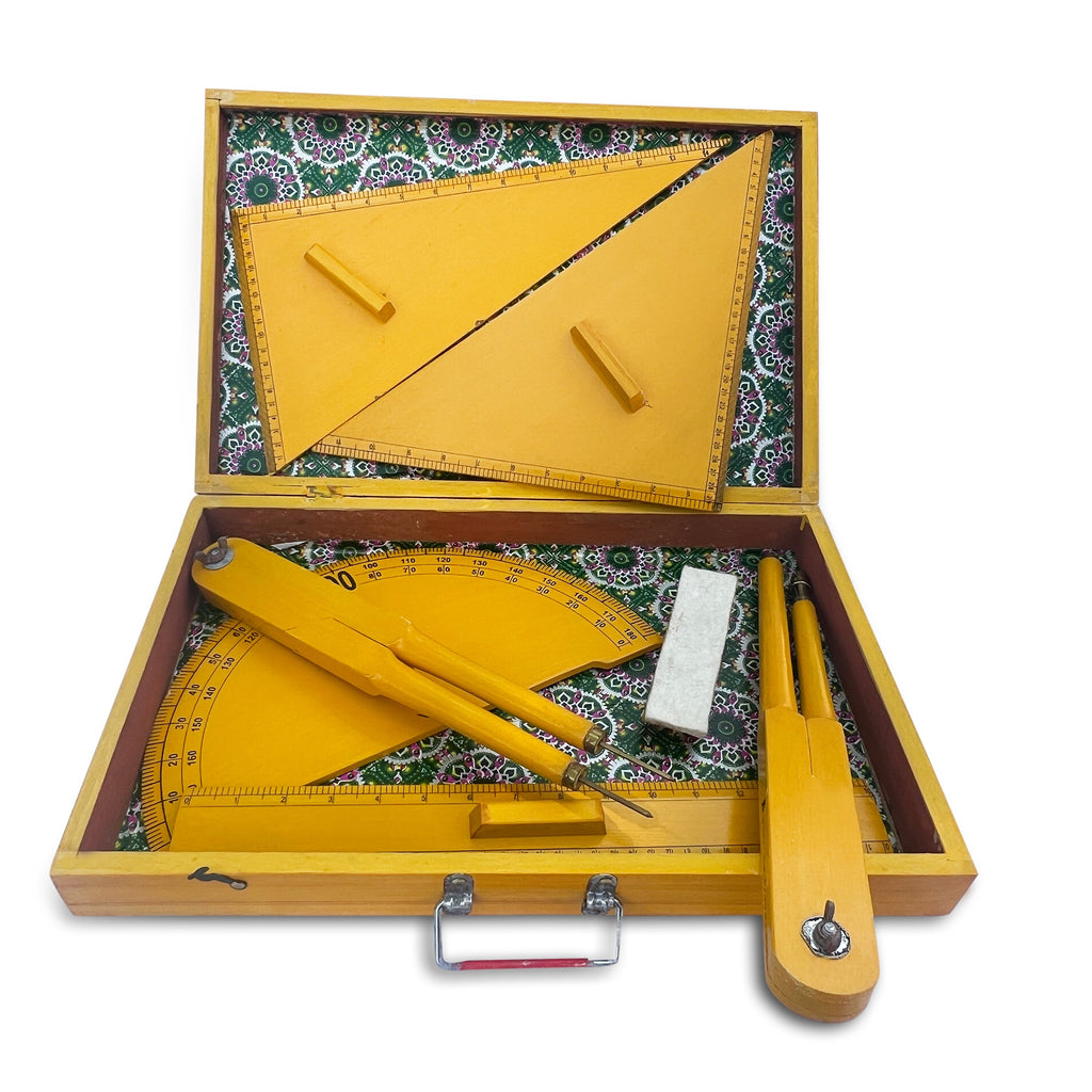 Wooden geometry box open, showing set squares, protractor, compass and ruler