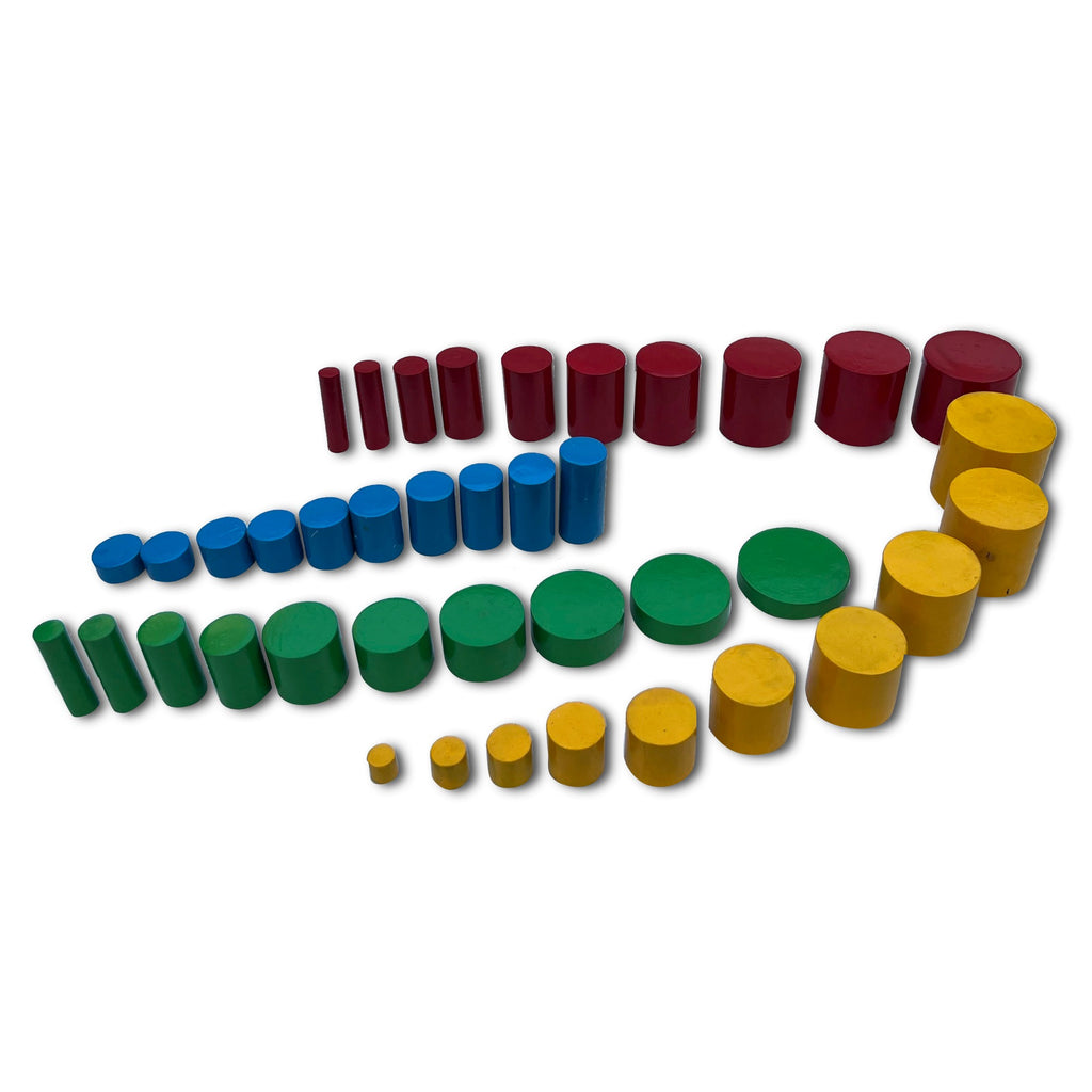 Four sets of knobless cylinders graded by size