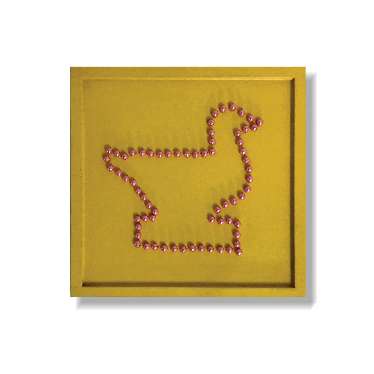 Beads mosaic board with pink beads forming a duck outline on a yellow board