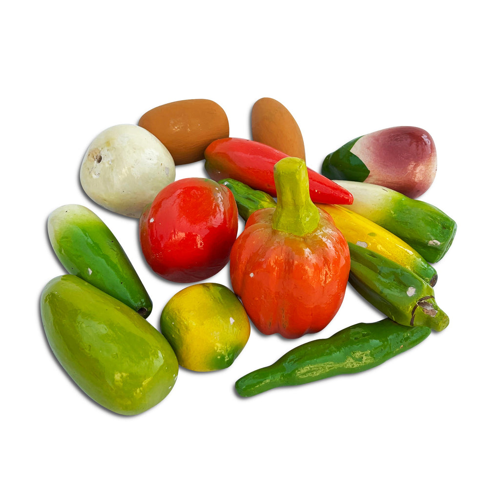 Wooden sculpted vegetables: capsicum, chillies, radish, brinjal, potato and more