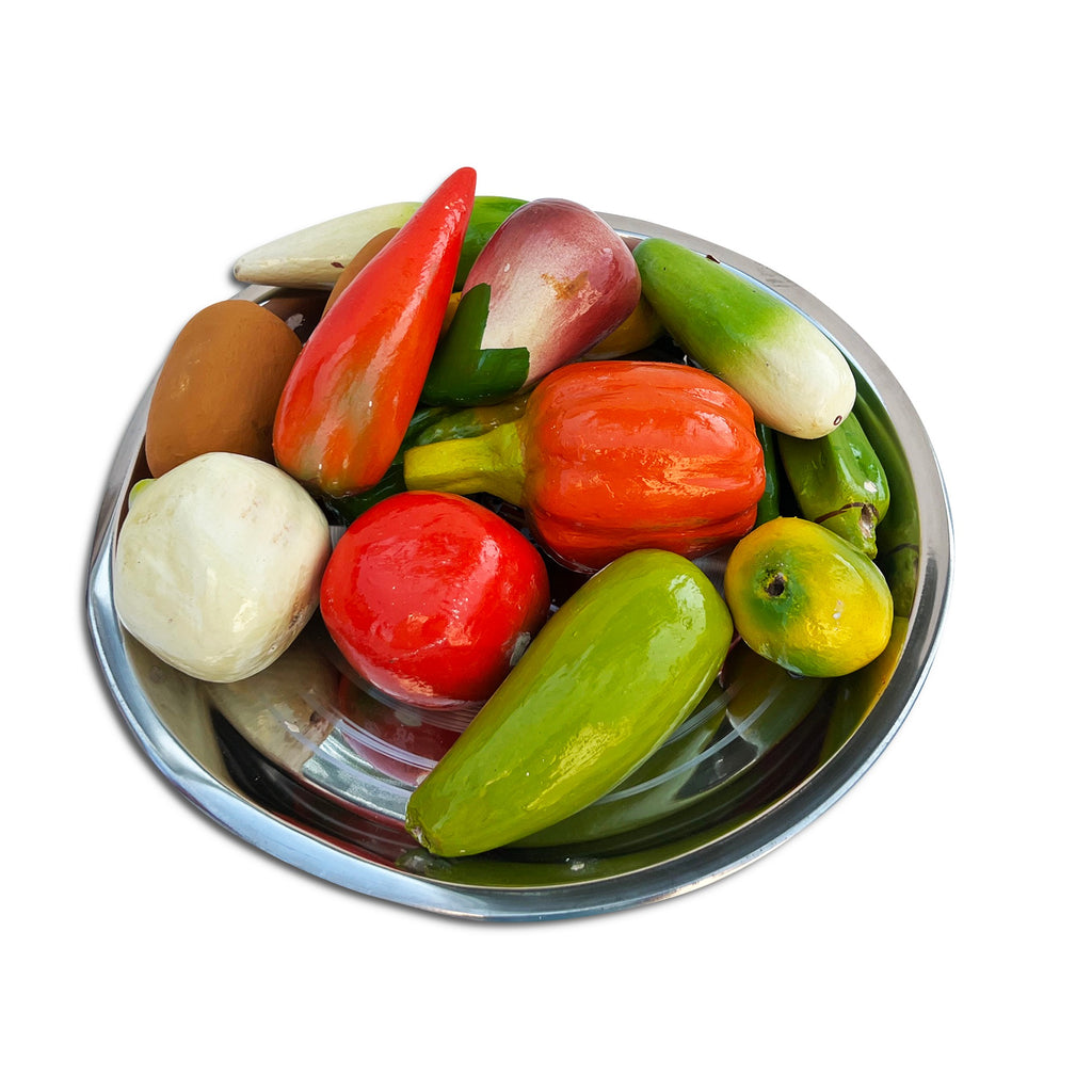 Wooden vegetables served in a steel plate