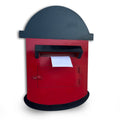 Big red pretend-play post box with a letter in the slot
