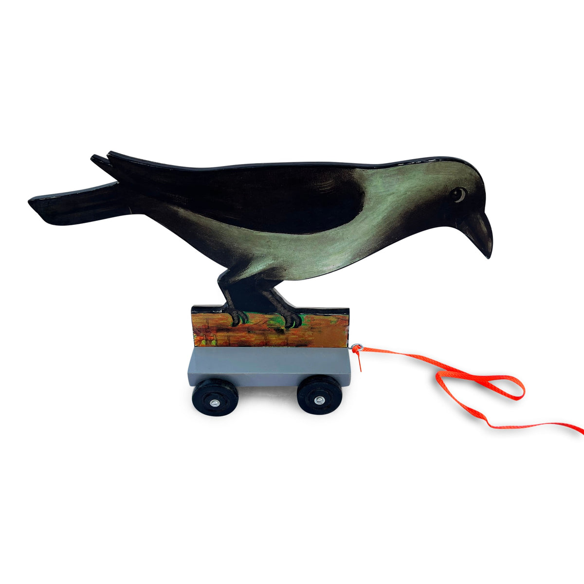 Crow pull-along toy on grey wheeled base
