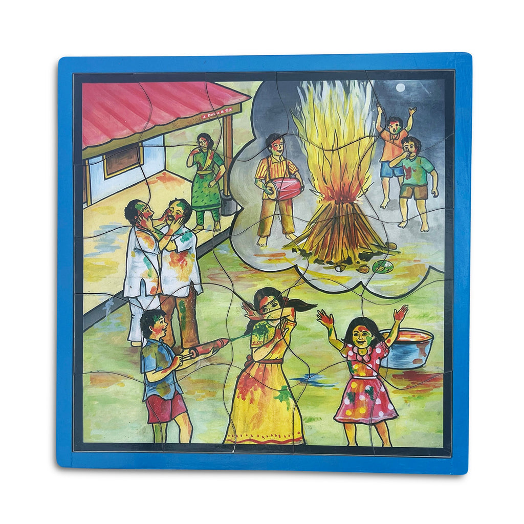 Holi jigsaw puzzle with colours and bonfire, assembled in tray