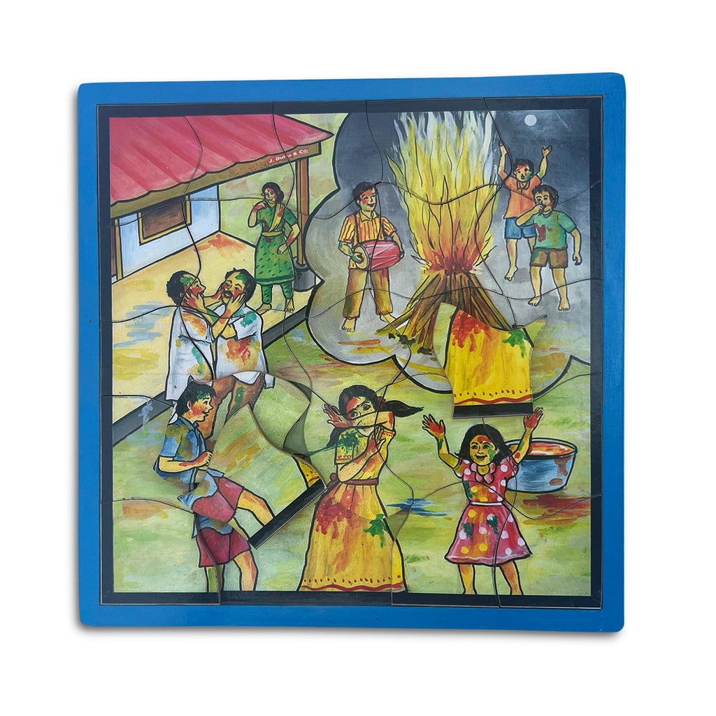 Holi festival puzzle with pieces being fitted into the tray