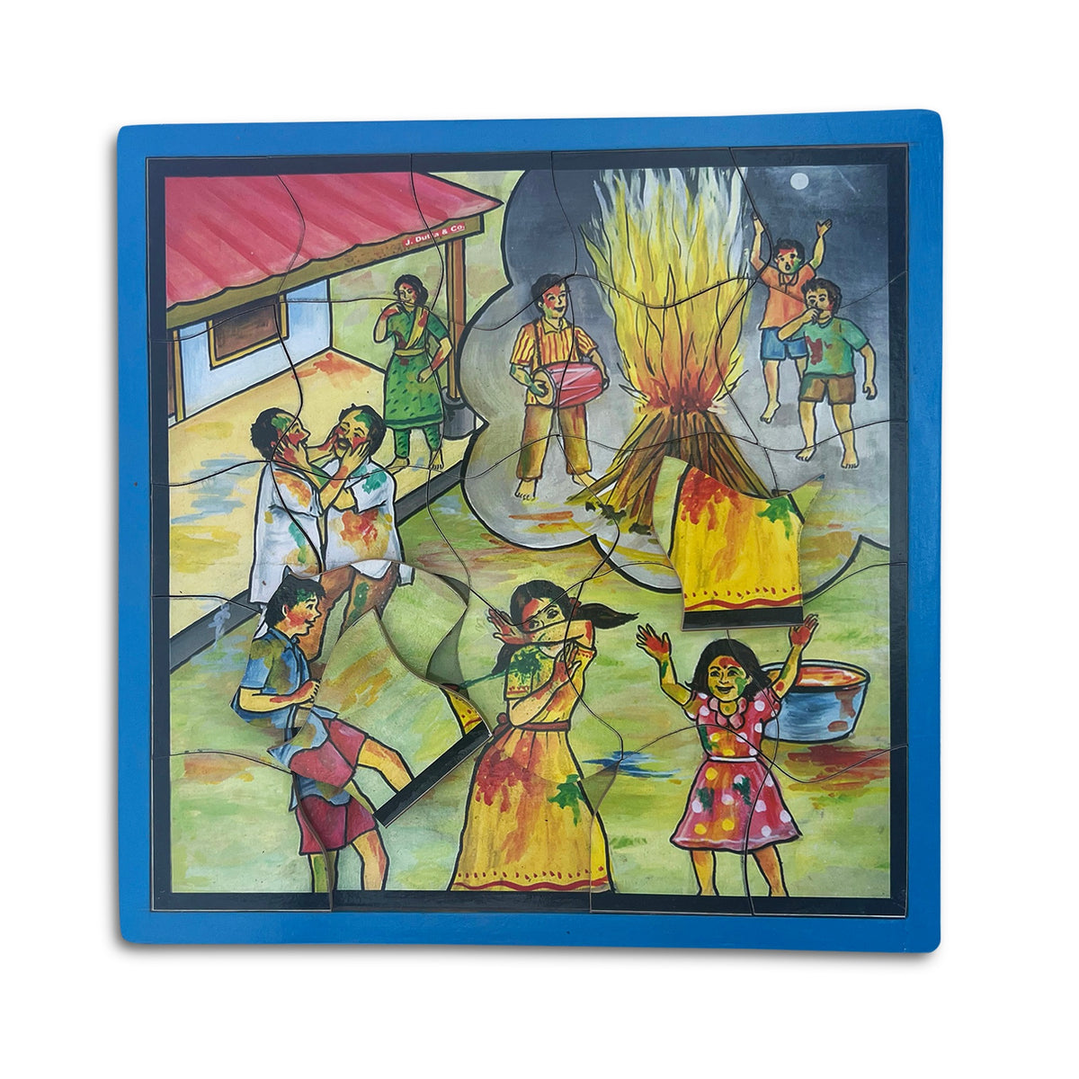 Holi festival puzzle with pieces being fitted into the tray