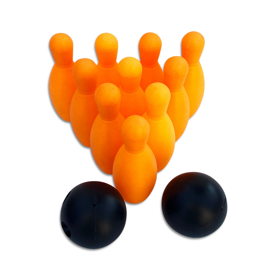 Orange bowling pins in a triangle with two black balls