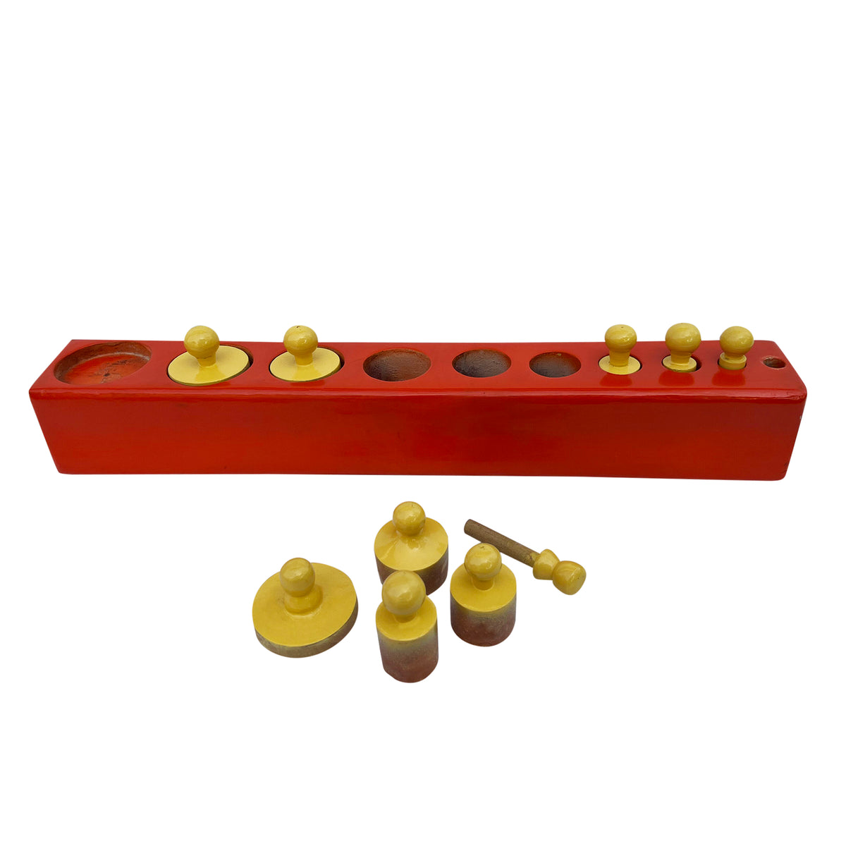 Cylinder block with yellow knobbed cylinders, some taken out