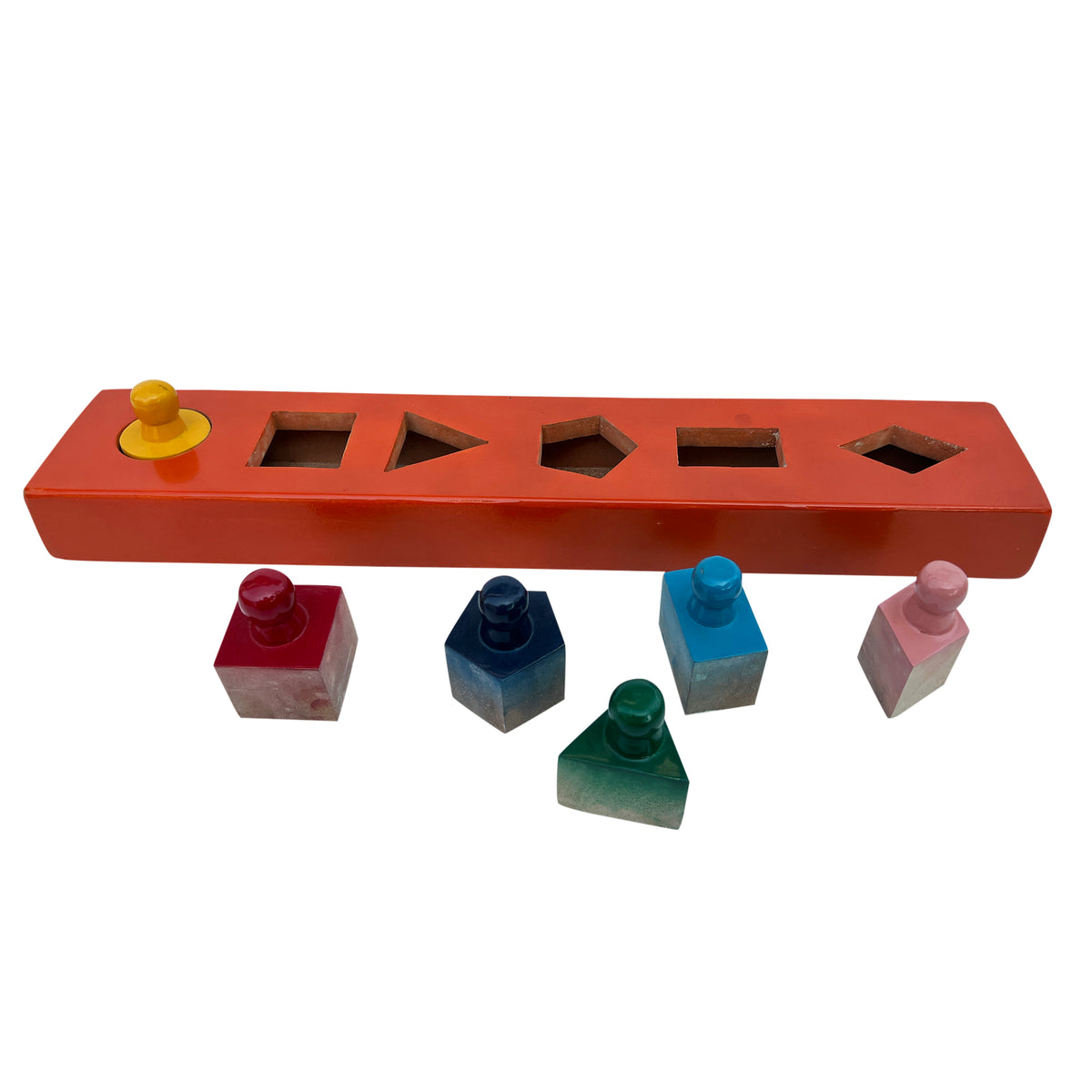 Cylinder block of shapes with knobbed shape pieces in front
