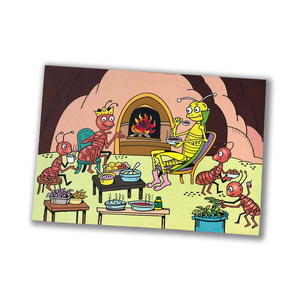 Ant and the Grasshopper story cut-out: ants feasting at home while the grasshopper sits by the fire